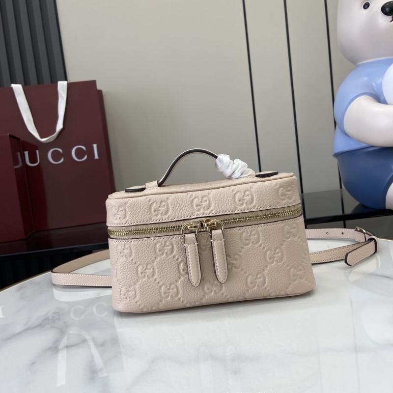 G*u*i cosmetic bags